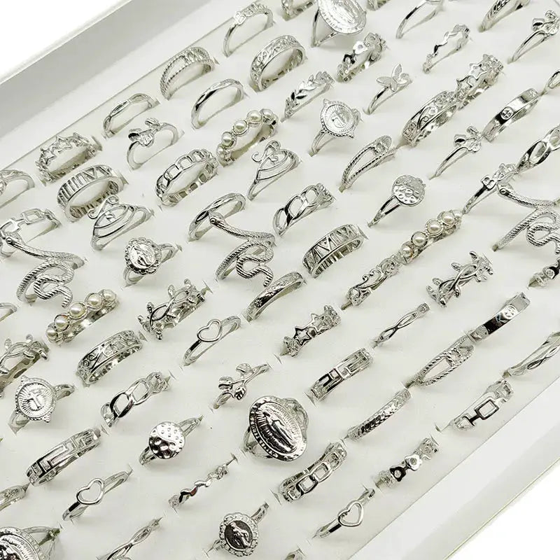30-piece silver-tone finger ring set for women featuring butterfly, pearl, star, and snake designs