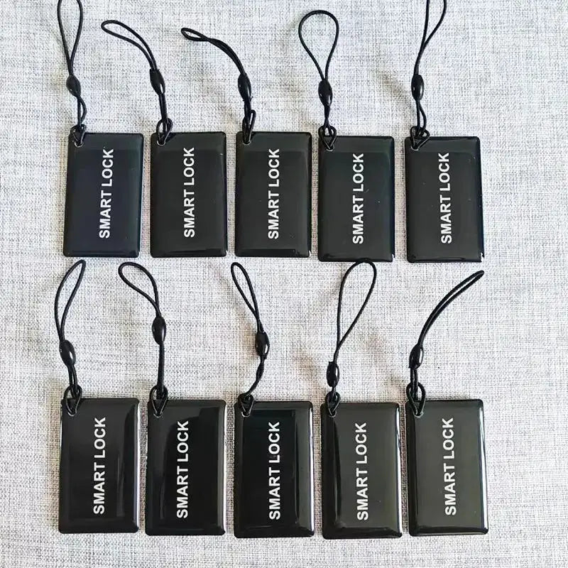 10 black plastic M1 proximity RFID cards with attached lanyards for smart door locks (13.56MHz)