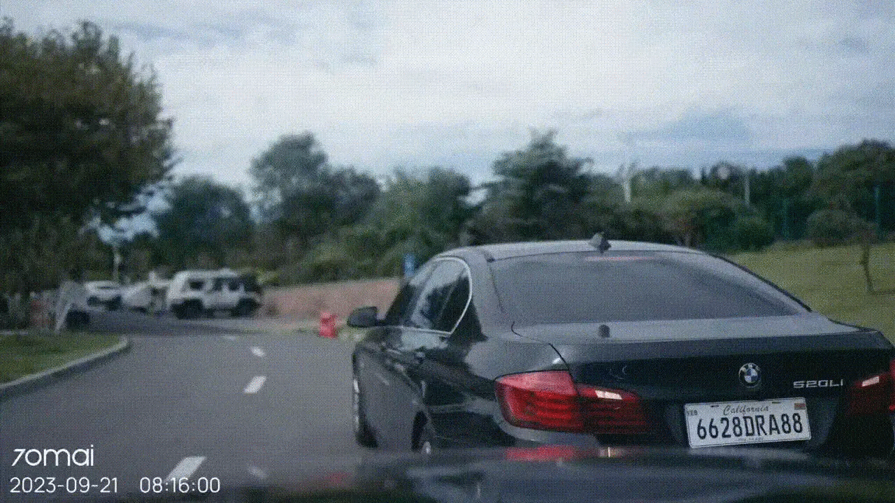 Dash cam A200 by 70mai; black BMW on road with 70mai watermark and timestamp