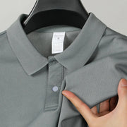 Gray men's polo shirt with textured mesh fabric, size S, 100% polyester.