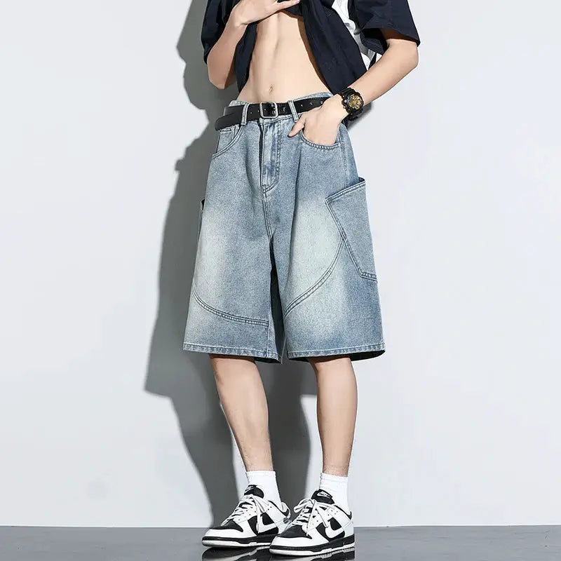Baggy denim shorts, light-wash vintage look, knee-length with large side pockets, casual streetwear.