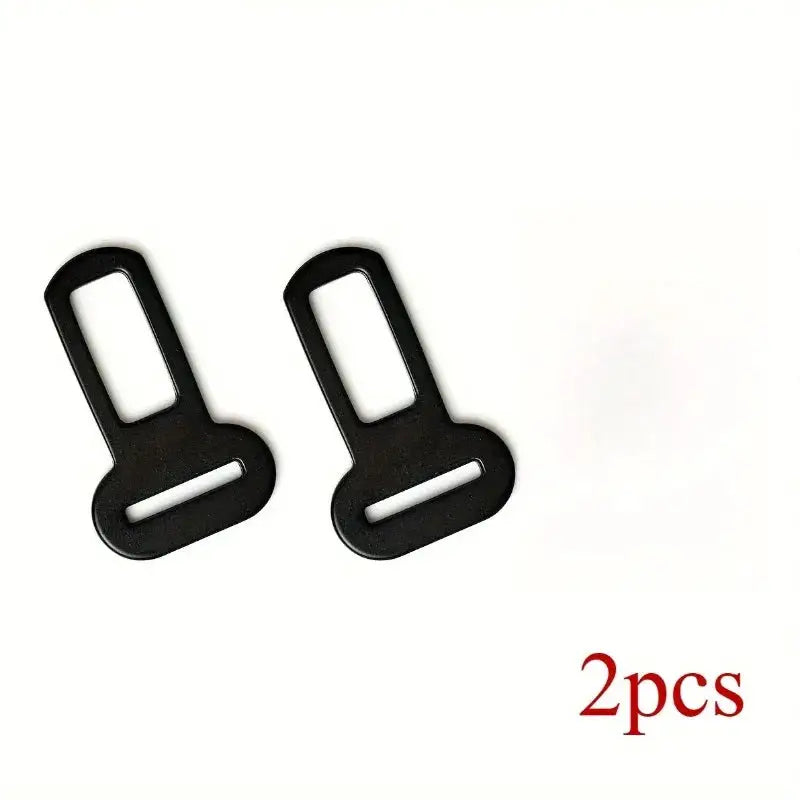 Pet seat belt adapters by Simples Market; two black metal clips for car or truck seats.
