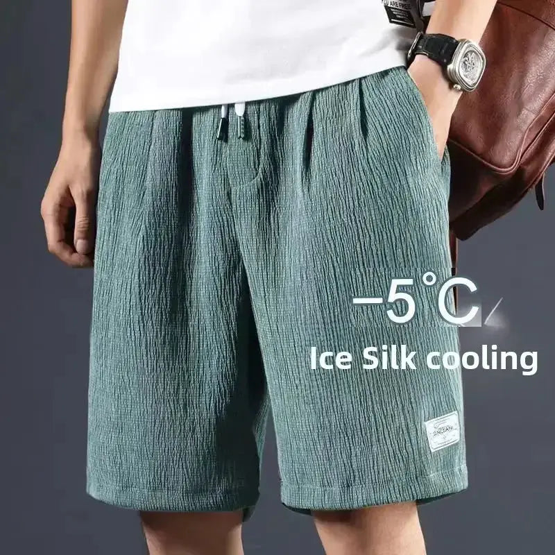 Men's ice silk cooling shorts in teal, loose-fit summer wear by Simples Market