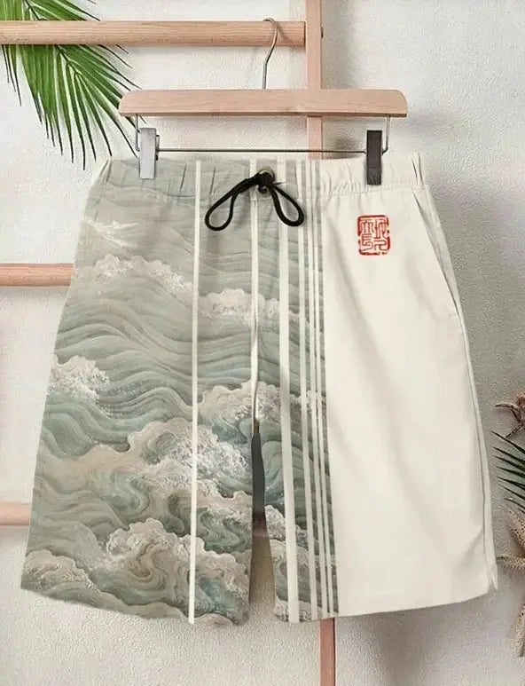 Men's casual shorts with 3D Japanese wave print, left grey-green panel, white right panel, black drawstring, red seal logo