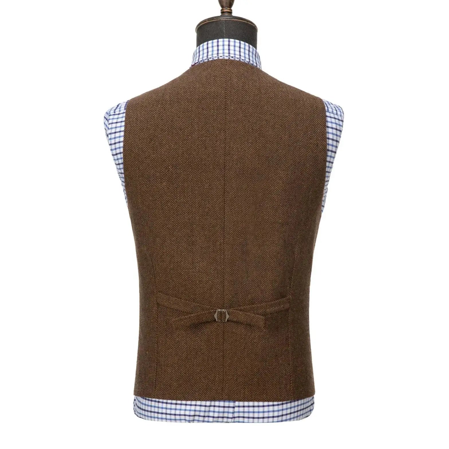 Brown wool tweed men's vest with herringbone pattern; sleeveless waistcoat over blue plaid shirt.