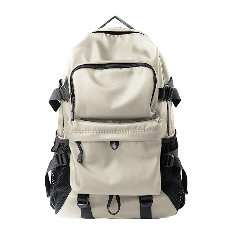 Laptop travel backpack in beige with front zip pocket and mesh side pockets