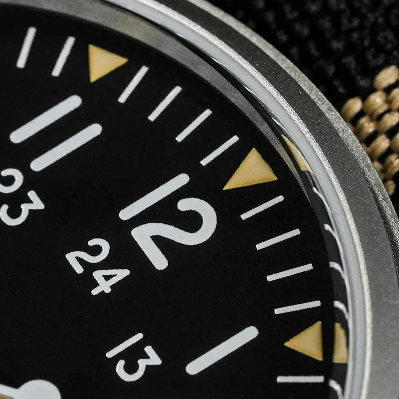 Militado ML07 military watch with black dial, luminous white numerals and yellow triangle markers, olive strap