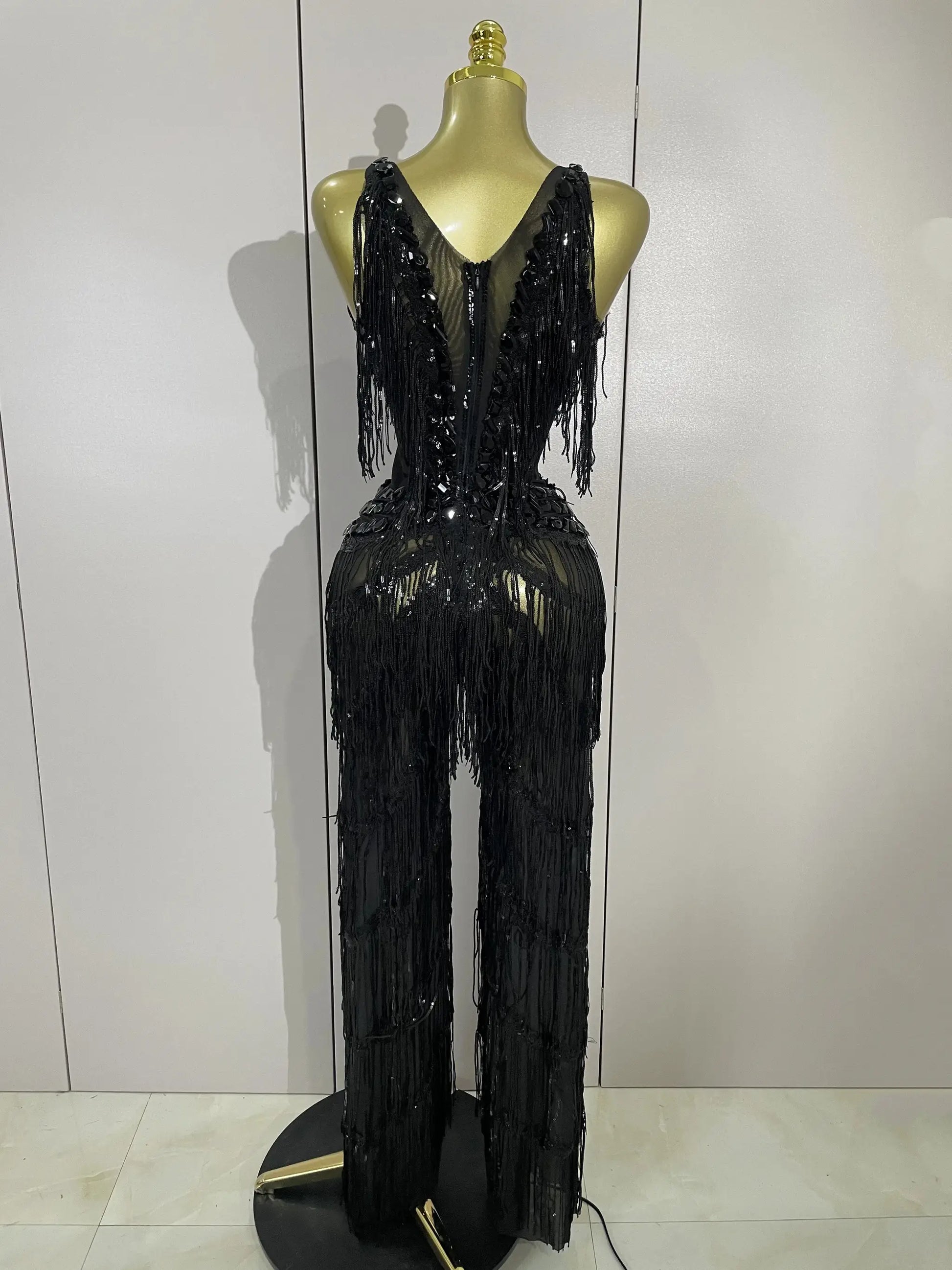 Jumpsuit, sparkly black rhinestone fringe with sequined tassels, back view