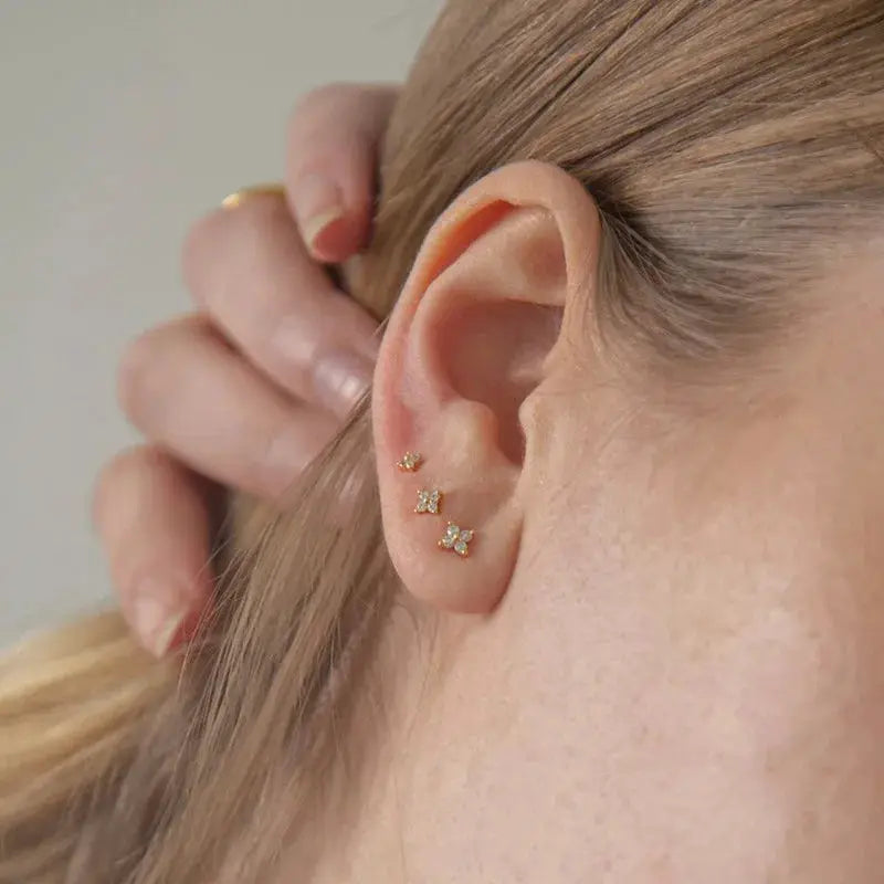 Simples Market 925 Sterling Silver zircon star tiny stud earrings set; three minimalist star studs adorn the earlobe
