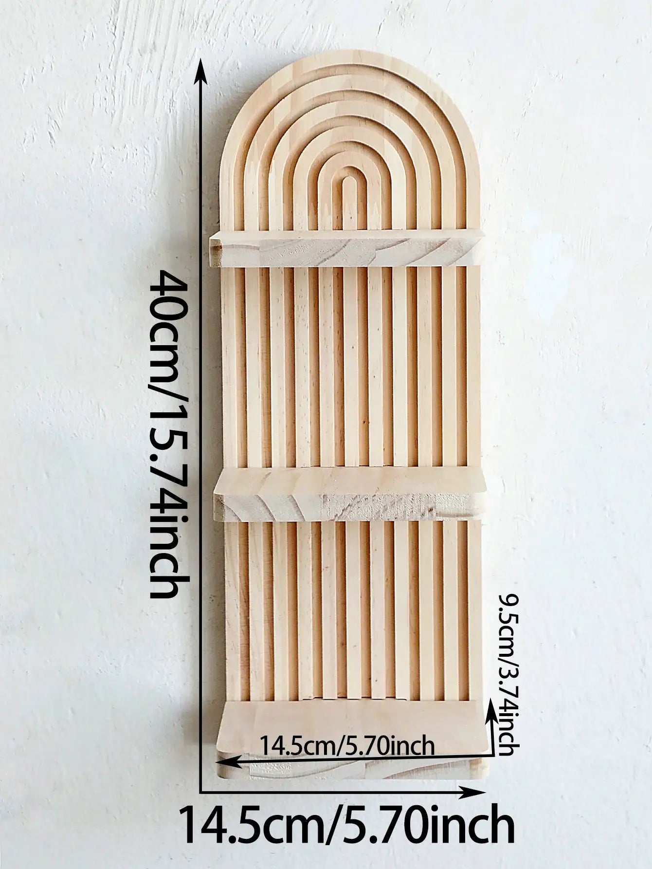 Boho-style wooden wall shelf with an arched geometric top in natural wood finish; wall-mounted decor.