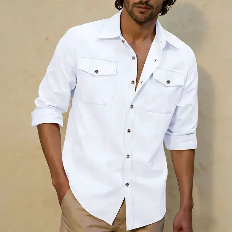 Men's white linen casual shirt with dual chest pockets, button-front, rolled sleeves.