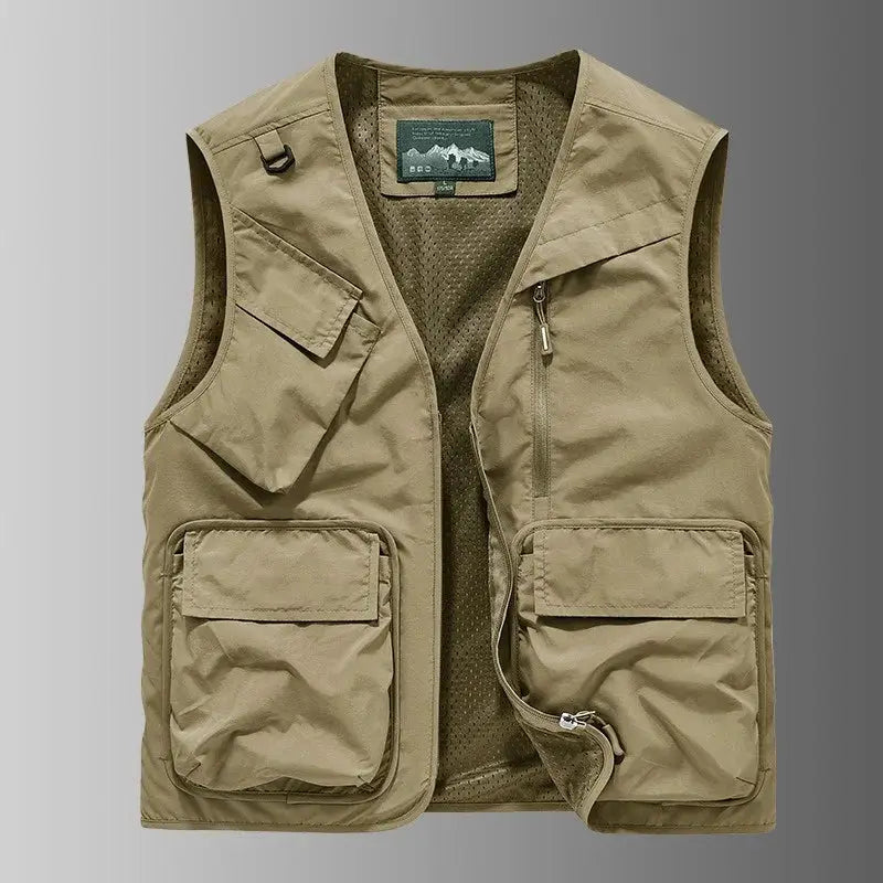 Men's tan utility vest by Simples Market with multiple pockets, zip front, and mesh lining.