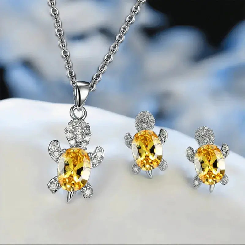 Three Piece Silver Plated Necklace Earrings Set For Ladies With Turtle Shape And Multicolor Glass Diamonds