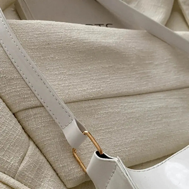Retro PU leather shoulder bag by Simples Market in white, with white strap and gold-tone hardware