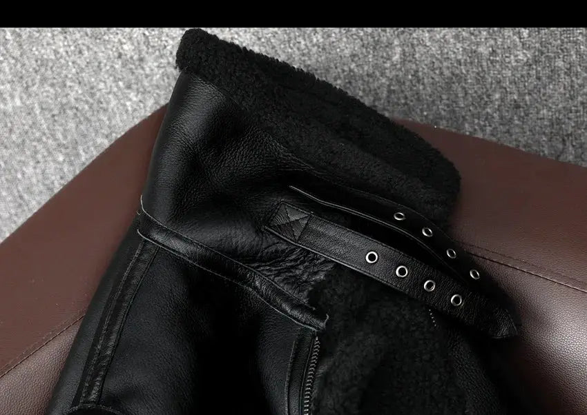 Leather fur jacket by Simples Market with black shearling lining and grommet belt