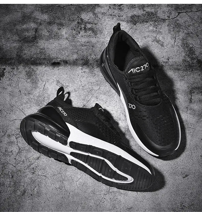 Pair of men's black mesh sneakers for outdoor jogging with white platform soles