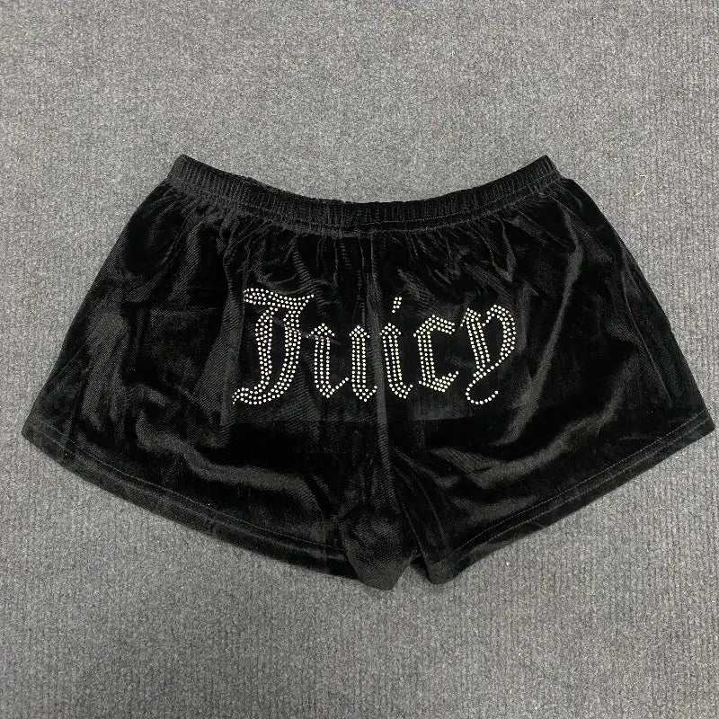 Women's black velvet shorts with sparkly rhinestone lettering