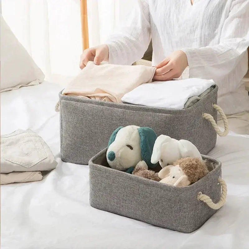 Folding gray linen fabric storage baskets with handles; set of two for underwear, socks and baby toys.