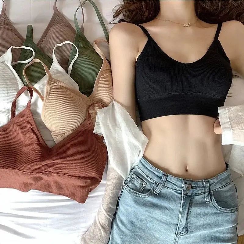 Kit of 4 women's seamless cotton bras by Simples Market; model wearing black padded bra.