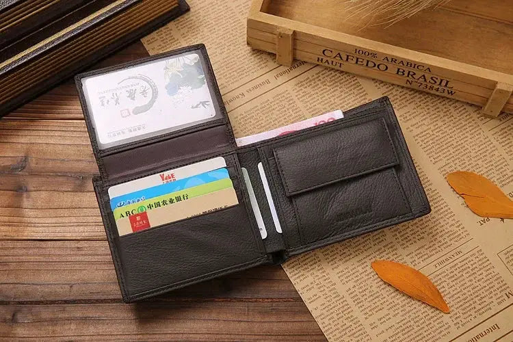 Leather men's wallet in black with card slots and ID window, open bifold showing cash