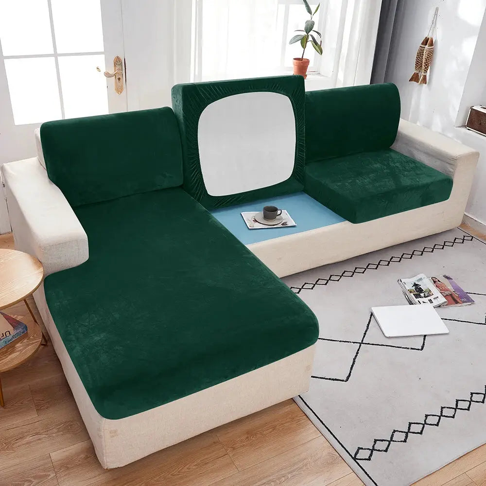 Simples Market plush sofa slipcover in emerald green velvet with anti-slip elastic.