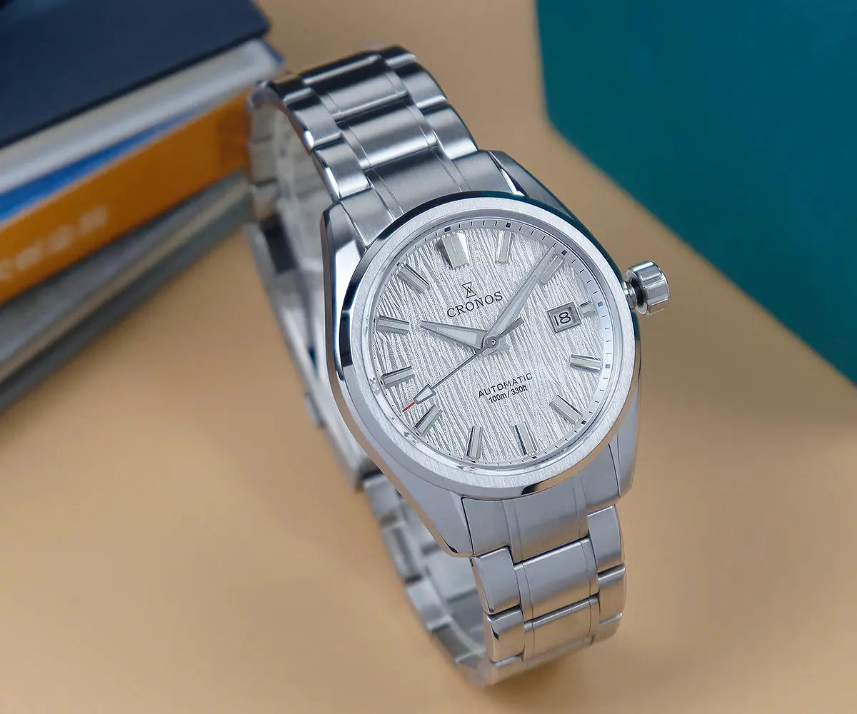 Cronos men's stainless steel watch with a white birch-pattern dial, date window, and matching bracelet
