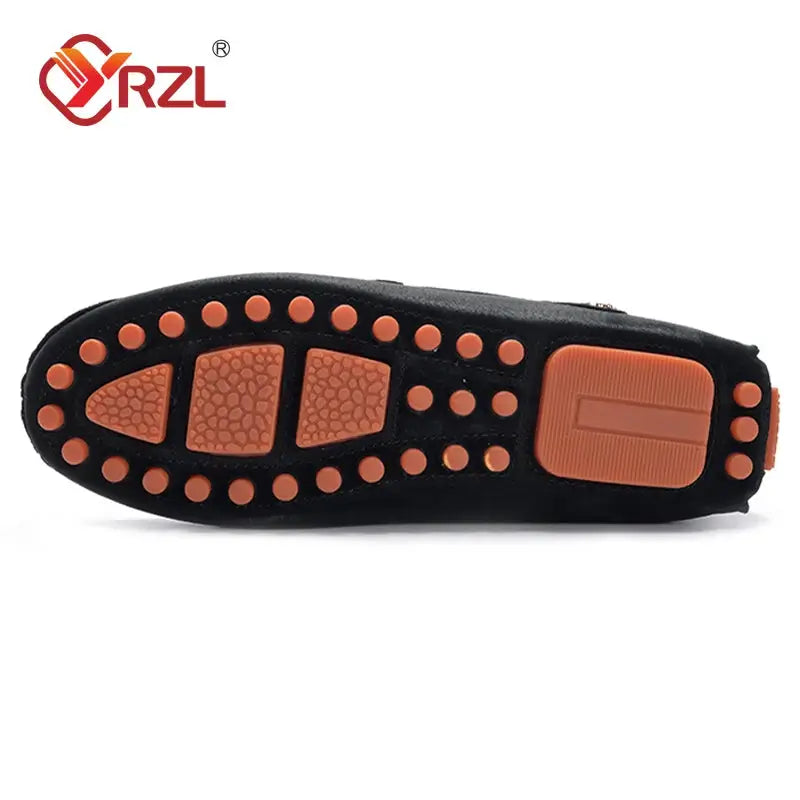 YRZL men's loafers sole view: black suede with orange rubber traction pods and heel pad