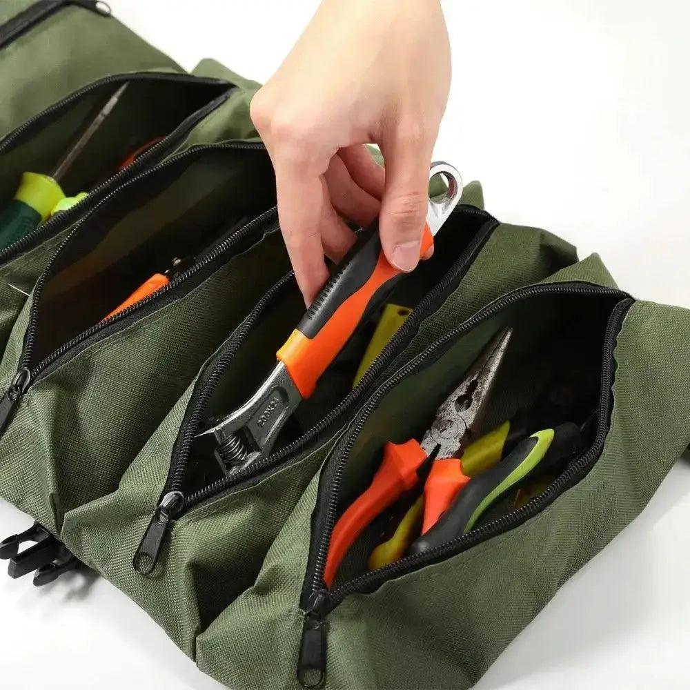 Simples Market green multi-pocket tool bag with zippered compartments, holding pliers and screwdrivers.