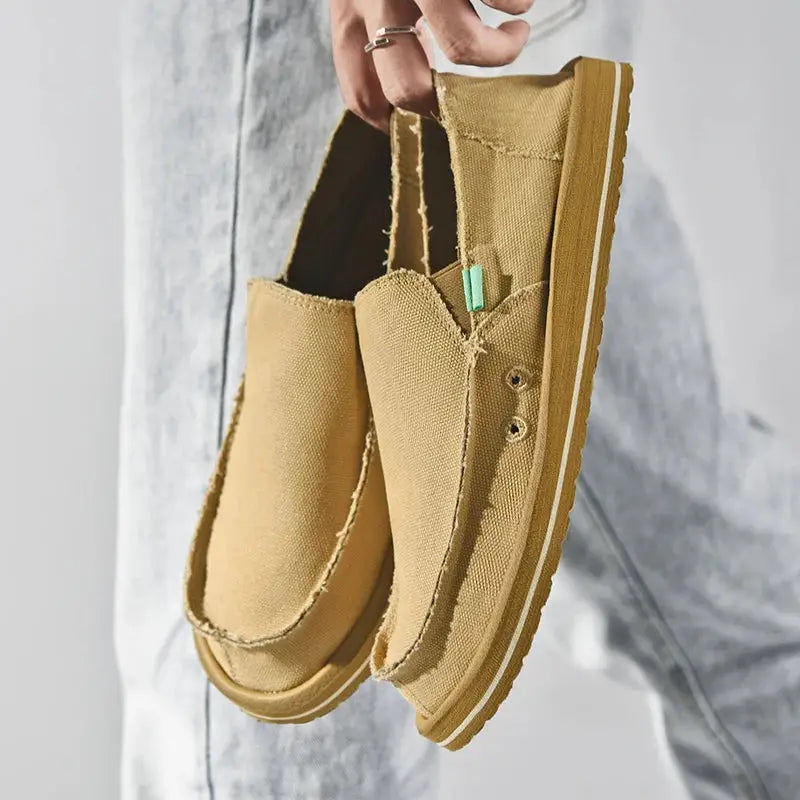Men's beige canvas loafers with thick sole and slip-on design