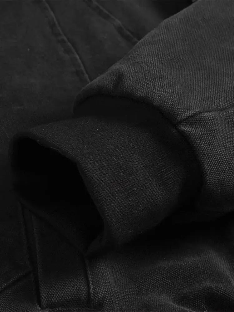 Mauroicardi black canvas padded jacket with rolled sleeve cuff, close-up texture