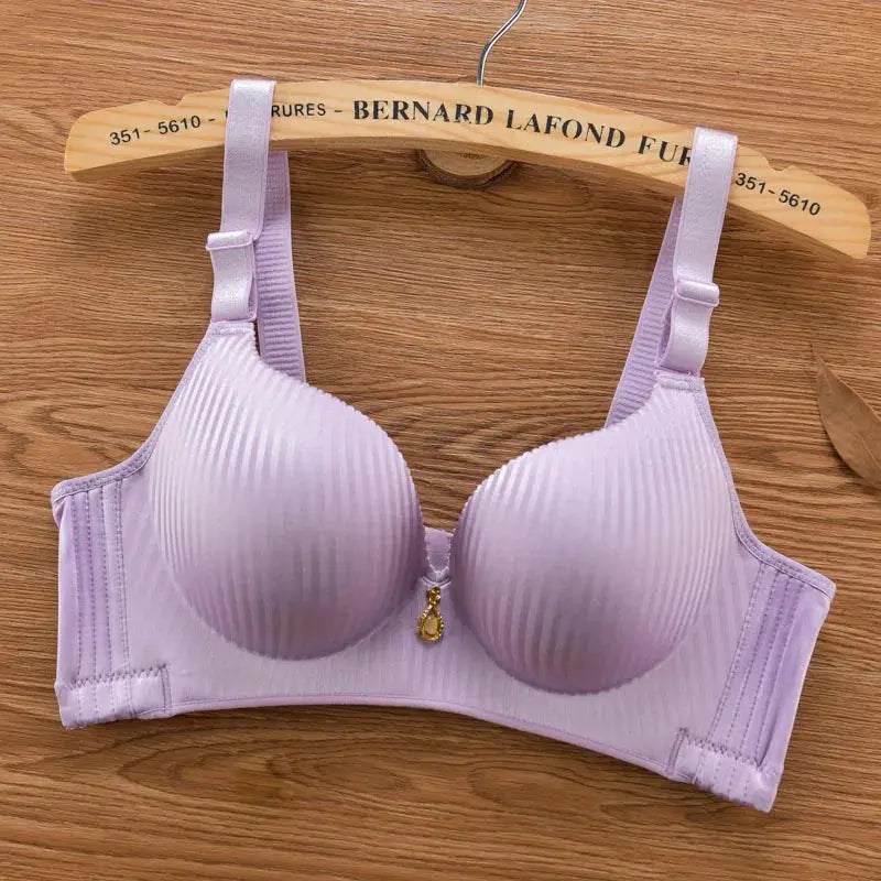 Lavender push-up bra with padded cups, wire-free, adjustable straps and a decorative charm between cups