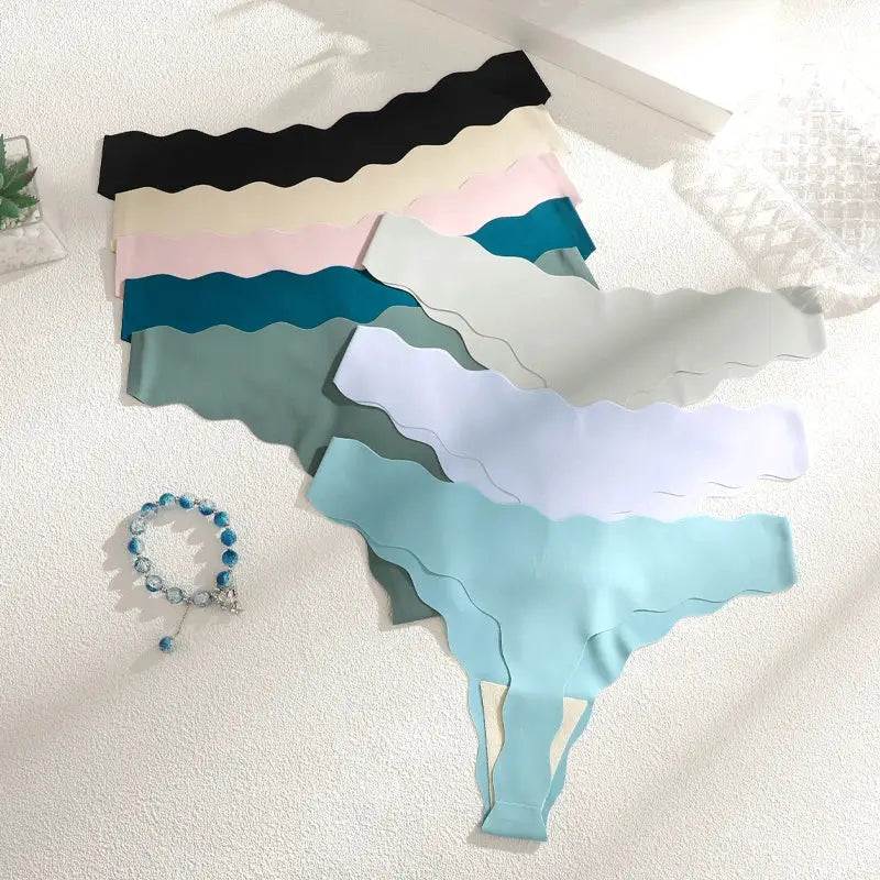 Seamless panties for women; ultra-soft fabric, low-rise T-back thong in assorted pastel colors