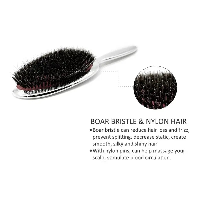 Simples Market boar-bristle paddle brush, silver oval handle with black bristles and nylon pins.