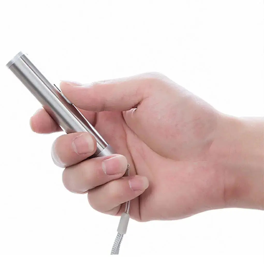 Pointer USB rechargeable 3-in-1 flashlight with stainless metal body and USB charging cable, held in hand