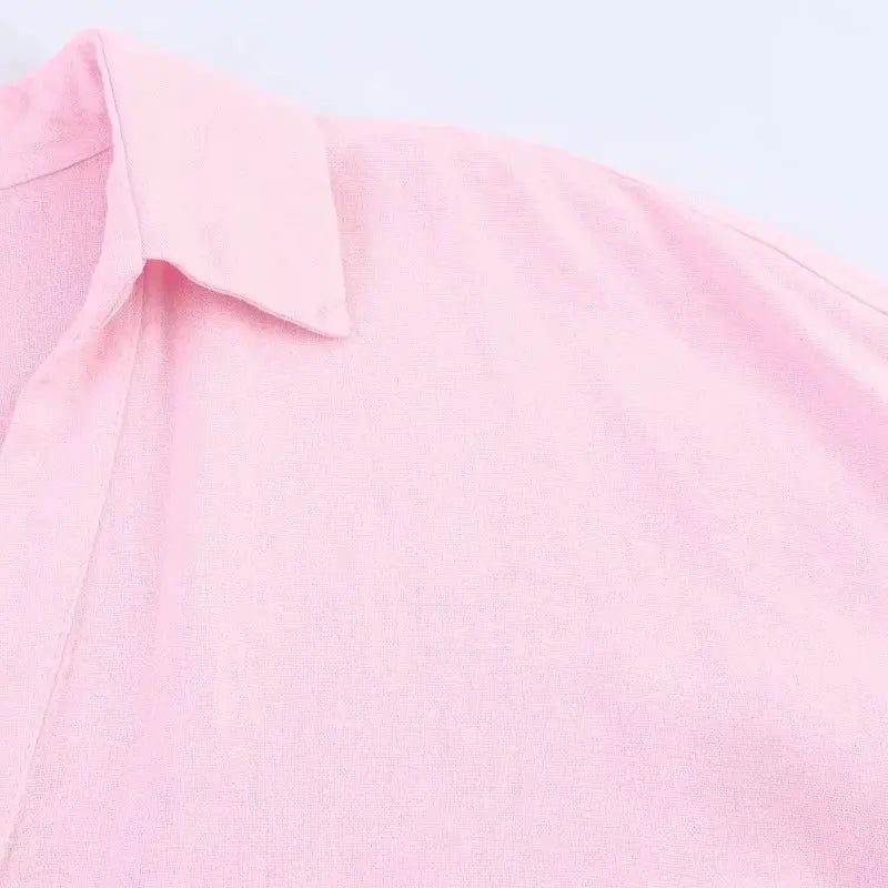 Pink women's collared shirt, casual loose-fit top close-up