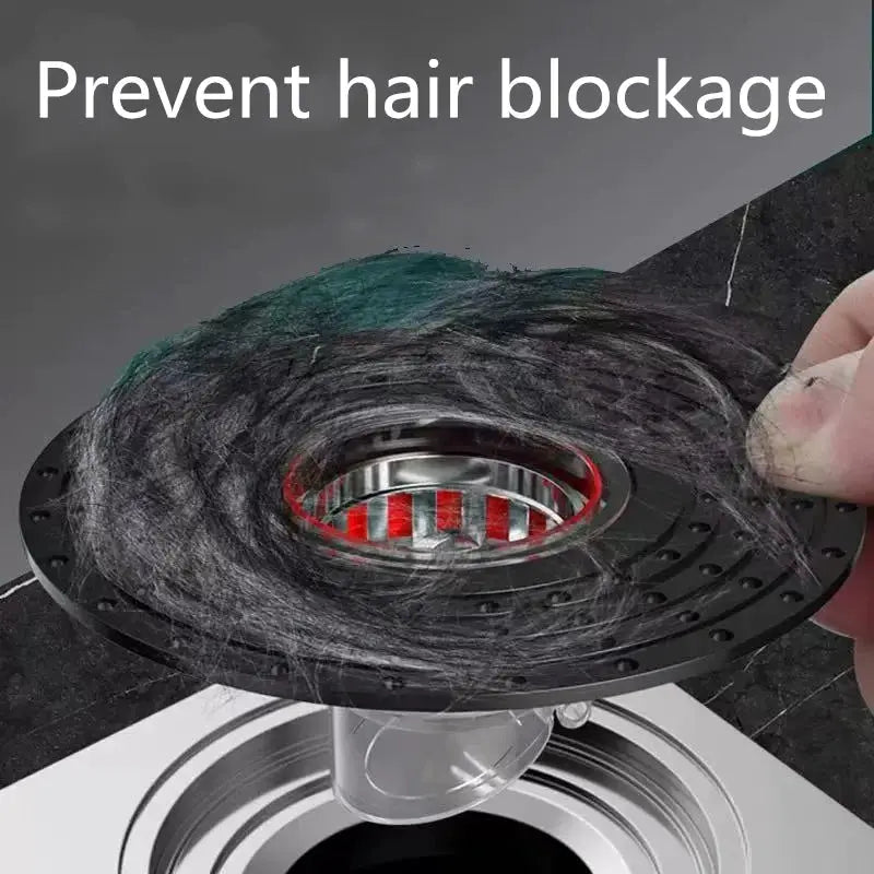 Simples Market floor drain core shower strainer cover, ABS black with metal inner grate catching hair.