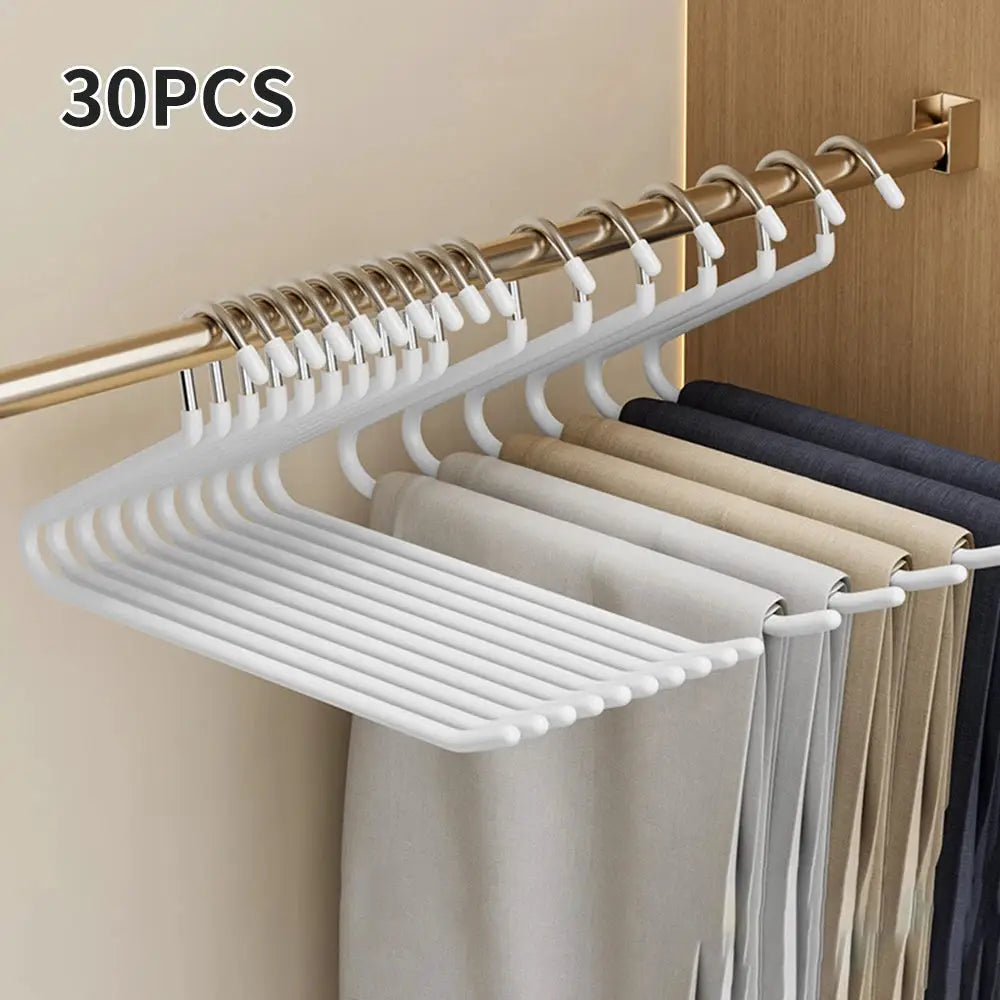30pcs goose-shaped pants hangers with anti-slip design on a closet rod