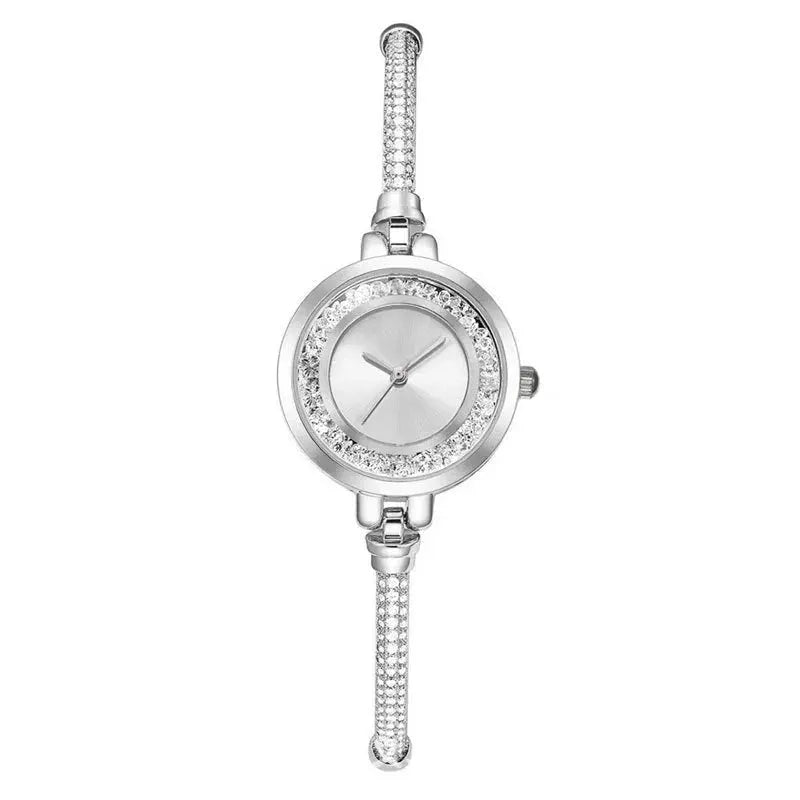Simples Market women's silver wristwatch with crystal-studded bezel and slim bracelet