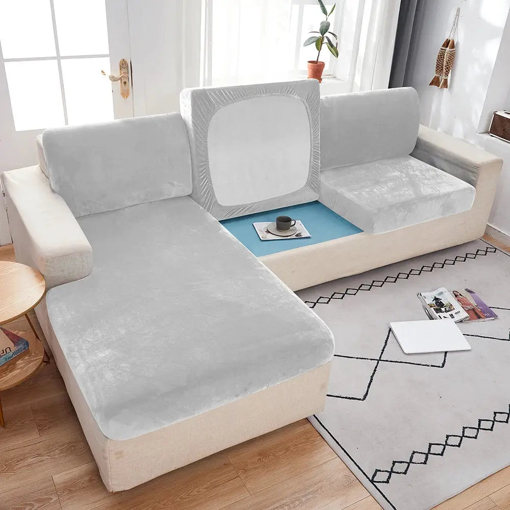 Sofa slipcover for sectional in light gray plush fabric with anti-slip elastic