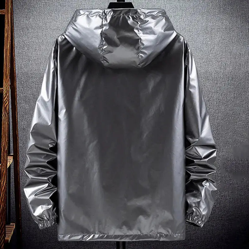 Men's shiny silver hooded windbreaker jacket with lightweight waterproof fabric and elastic cuffs