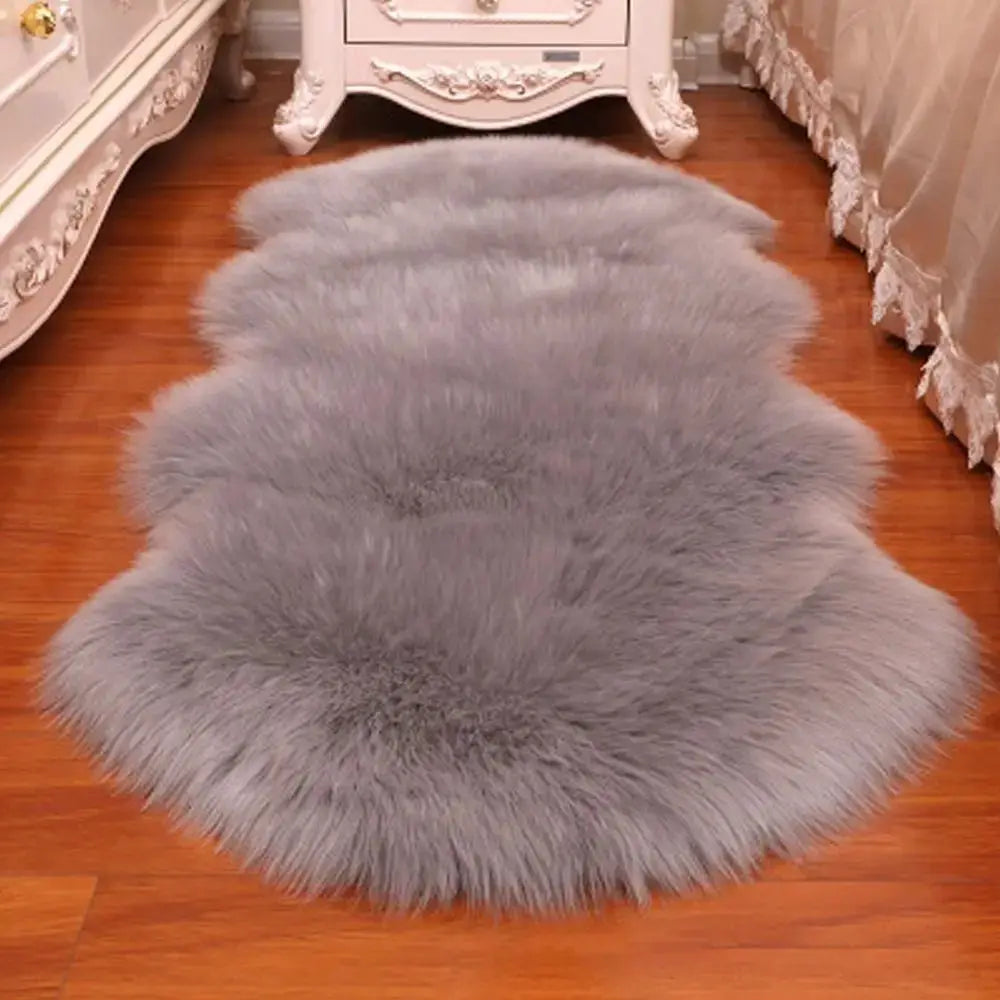 Gray artificial sheepskin long-hair rug, fluffy faux fur shaggy floor mat for home decor.
