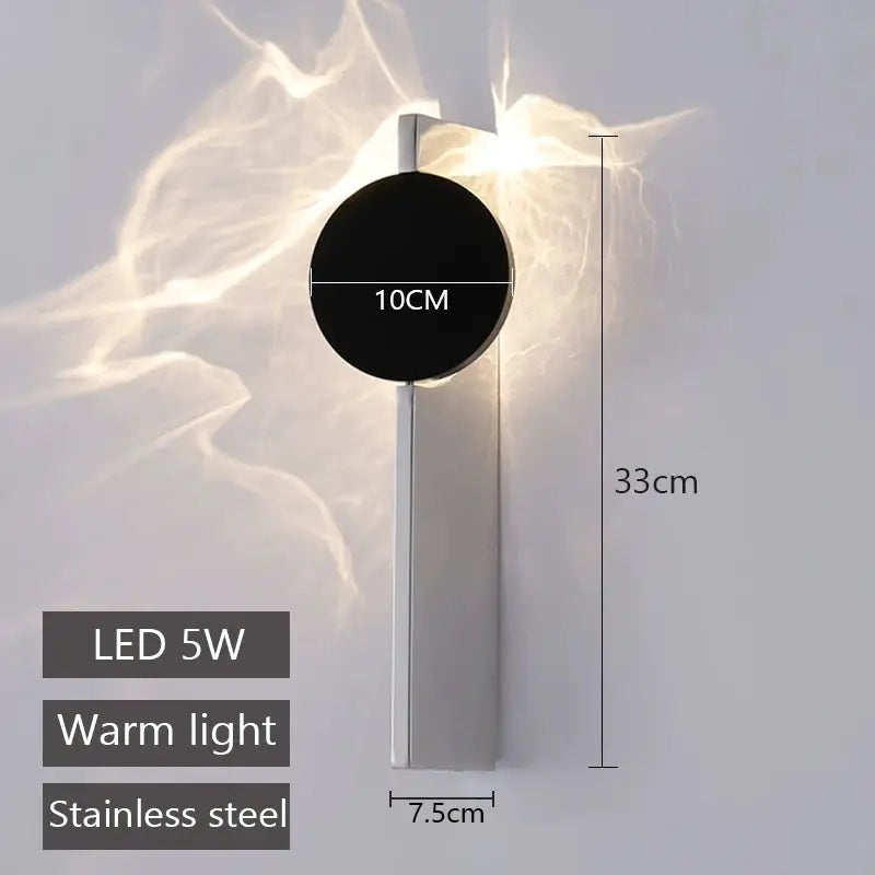 Simples Market LED wall lamp, rotatable stainless steel wall sconce with a 10cm black circular head, warm white 5W