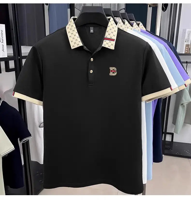 Black short-sleeve polo shirt by Simples Market with beige patterned collar and cuffs and embroidered B logo.