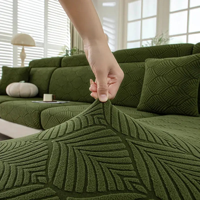 Simples Market thick plush green sofa cover with elastic edges and geometric textured pattern