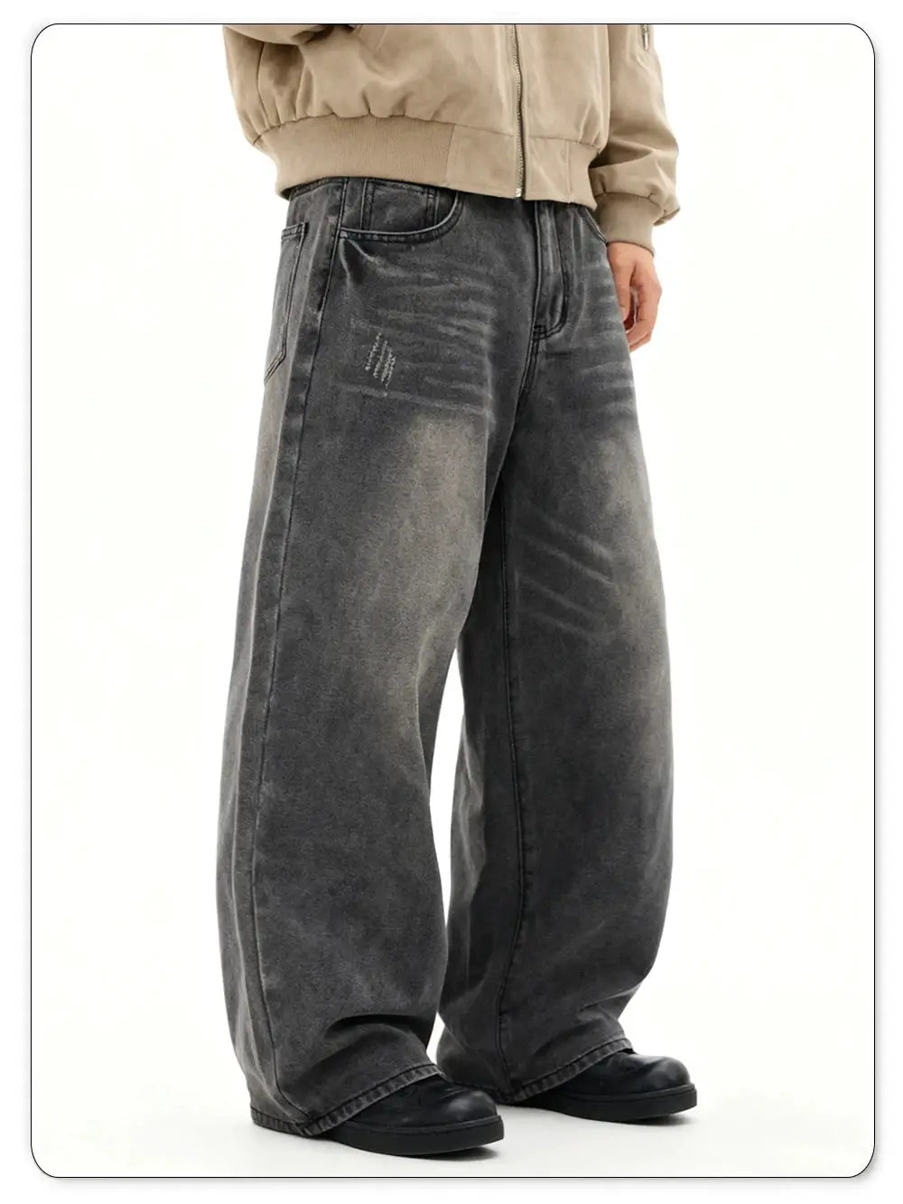Men's gray baggy wide-leg denim jeans with distressed patches and faded wash