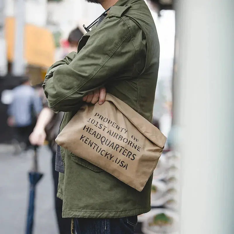 Olive green M65 field jacket with pockets; tan tote bag (2 items)