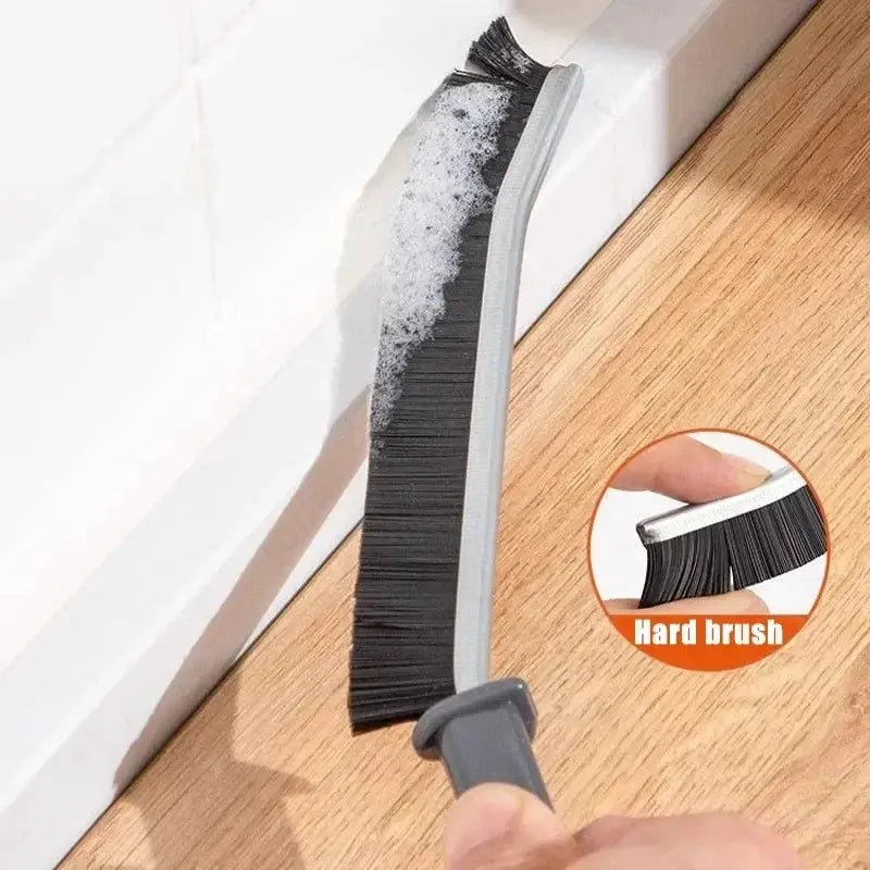 Simples Market grout cleaning brush with hard black bristles for tile joints and showers, angled gray handle.