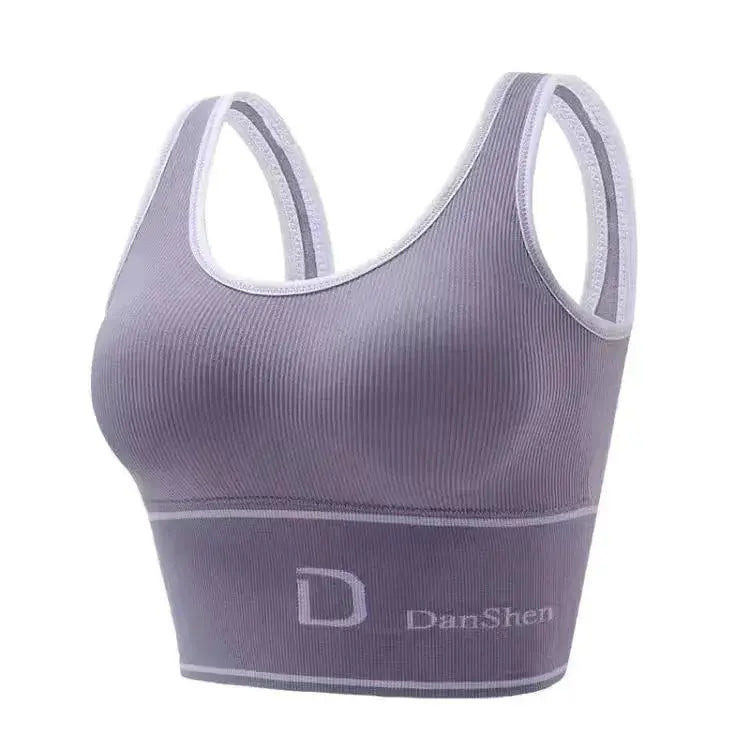 Women's plus-size lavender seamless ribbed sports bra top; wireless, full-coverage with Danshe logo.