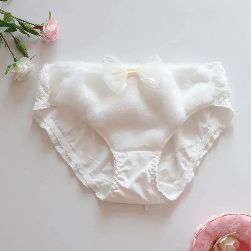Women's white cotton panties with a cute front bow and scalloped lace trim
