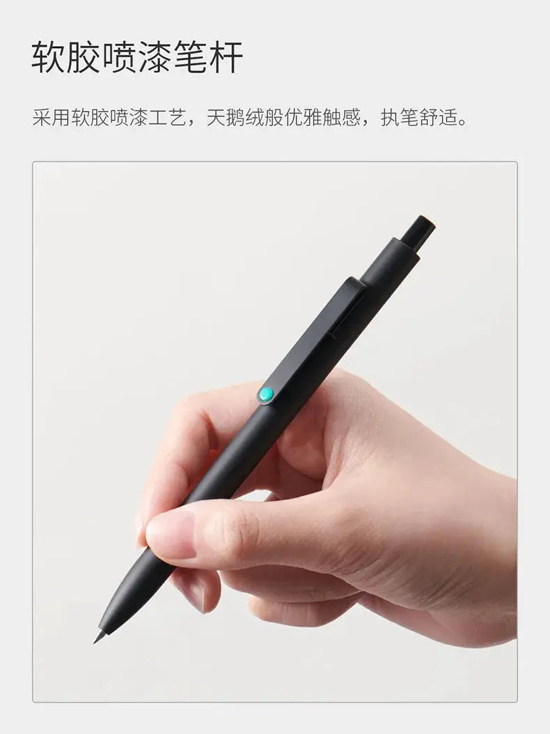 KACO 0.5mm MIDOT gel ink pen, black body with turquoise clip, held in hand.